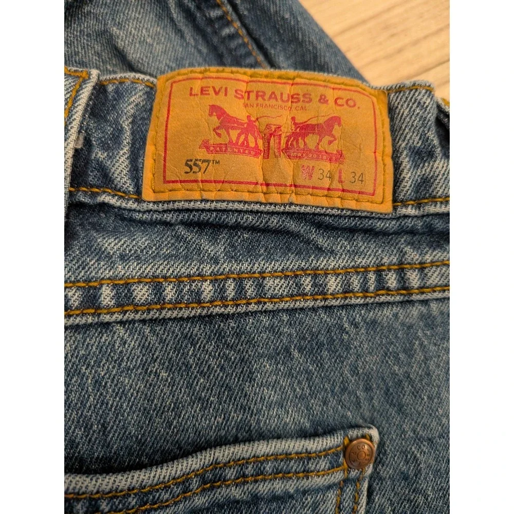 Levi's 557 Men's Jeans 34x32 Blue Denim Straight Leg 10